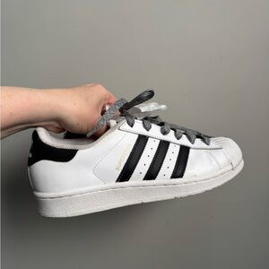 Womens Adidas Superstar White and Black Sneakers with additional new laces